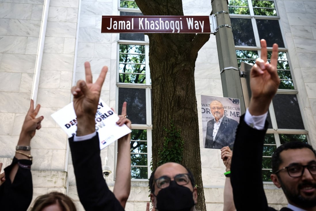 Human rights activists outside the embassy in Washington Photo: Reuters