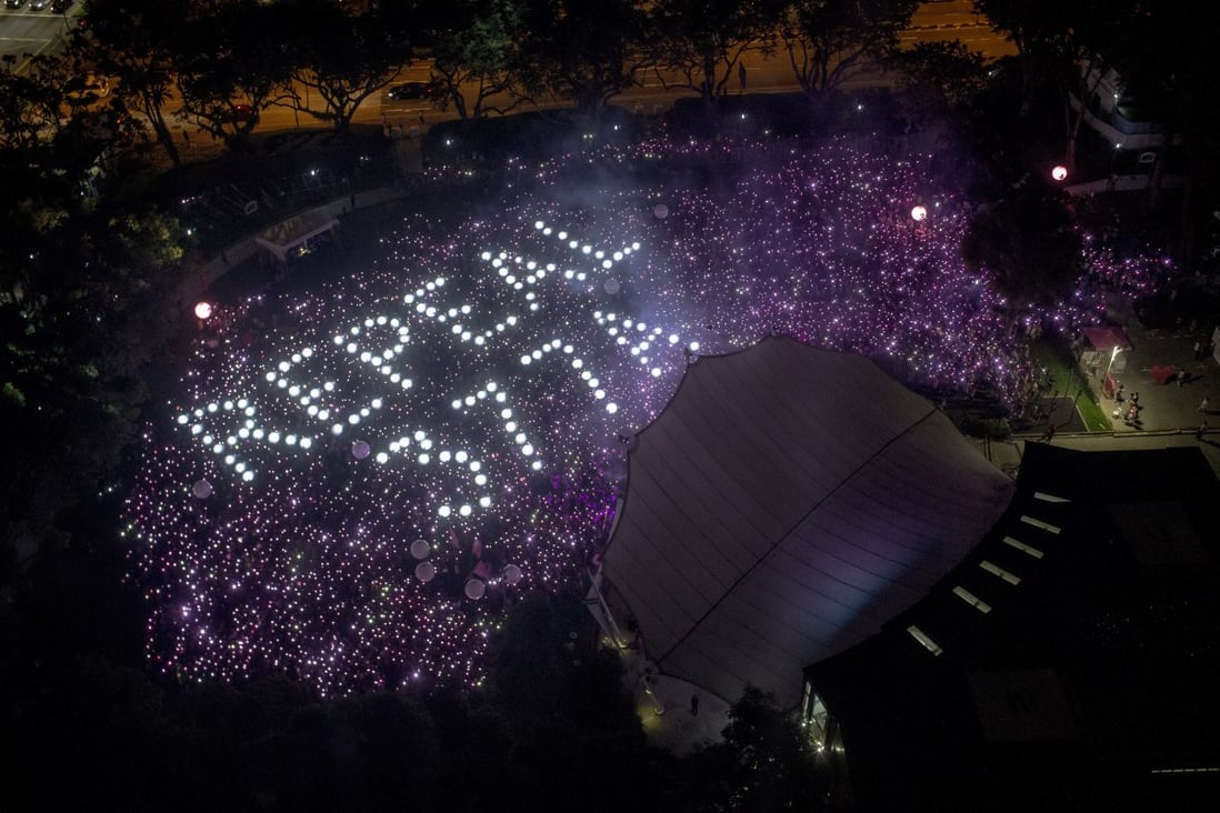 The words ‘Repeal 377A’ referencing a law that criminalises gay sex in Singapore are seen at the 2019 Pink Dot event in Hong Lim Park. Photo: EPA-EFE