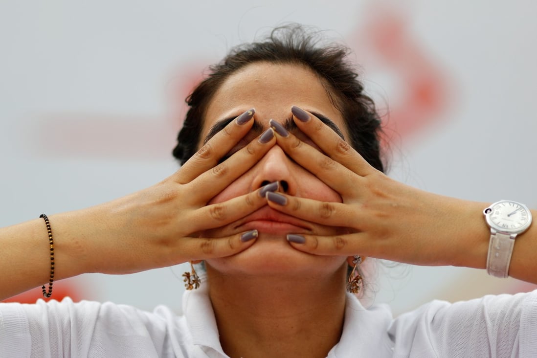 Amid social distancing during the Covid-19 pandemic, in the old quarters of Delhi, India, a participant still performed yoga during World Yoga Day in 2021. Photo: Reuters