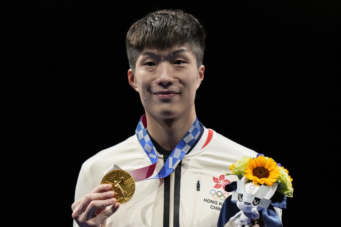 Edgar Cheung Ka-long
holds his gold medal during the award ceremony at the 2020 Tokyo Olympic Games. Photo: AP