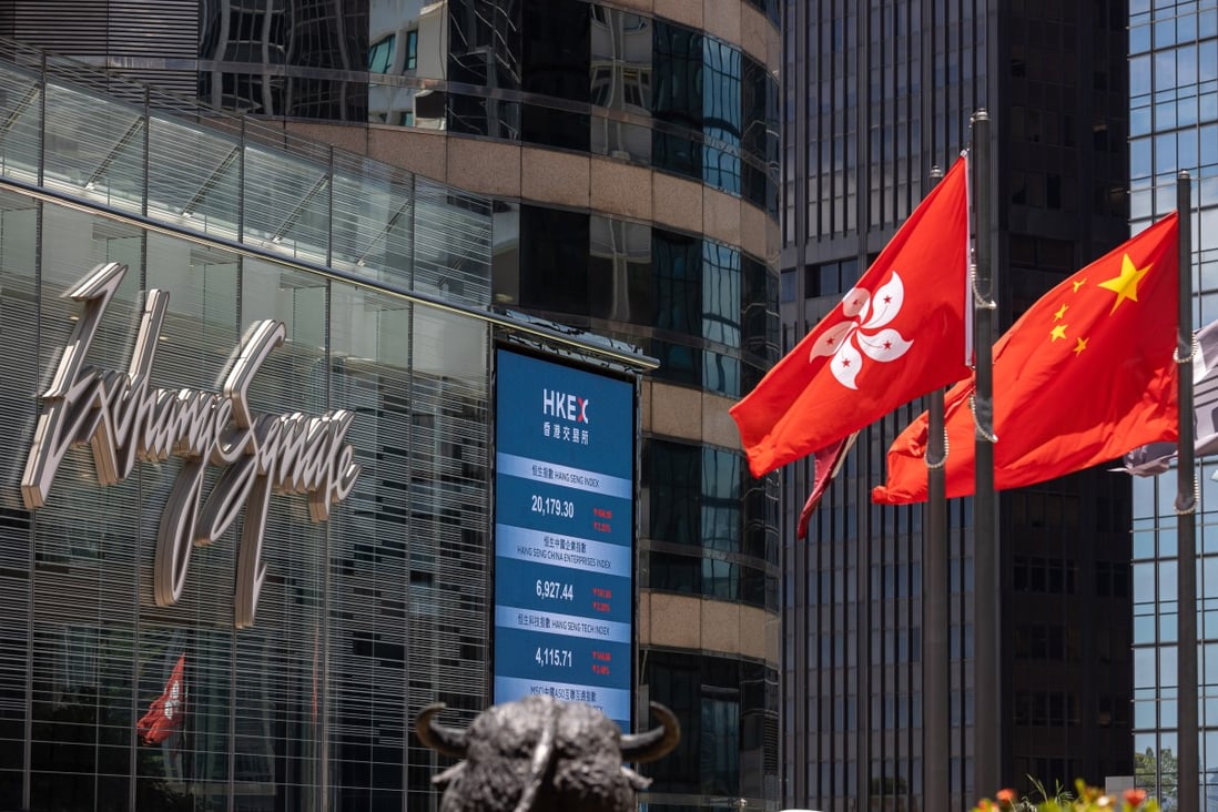 An electronic board displays the latest stock transactions outside Exchange Square in Central,  Hong Kong in May 2022. Photo: EPA-EFE