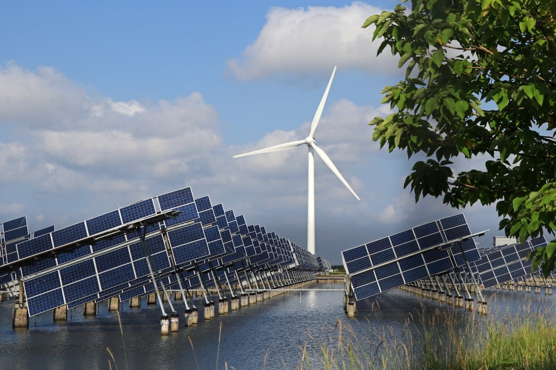 A hybrid power station consisting of wind turbines, solar panels and fish ponds in Dongtai, China. The country’s pledge to reach carbon neutrality is the subject of science fiction writer Chen Qiufan’s latest book. Photo: Getty Images