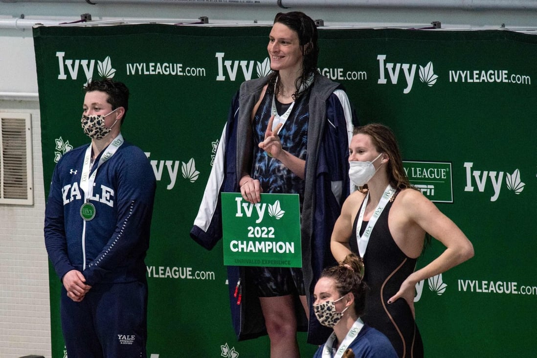 Transgender swimmer Lia Thomas, second left, of Penn University and transgender swimmer Iszac Henig, left, of Yale at the 2022 Ivy League Women’s Swimming & Diving Championships at Harvard University in Cambridge, Massachusetts. Photo: AFP