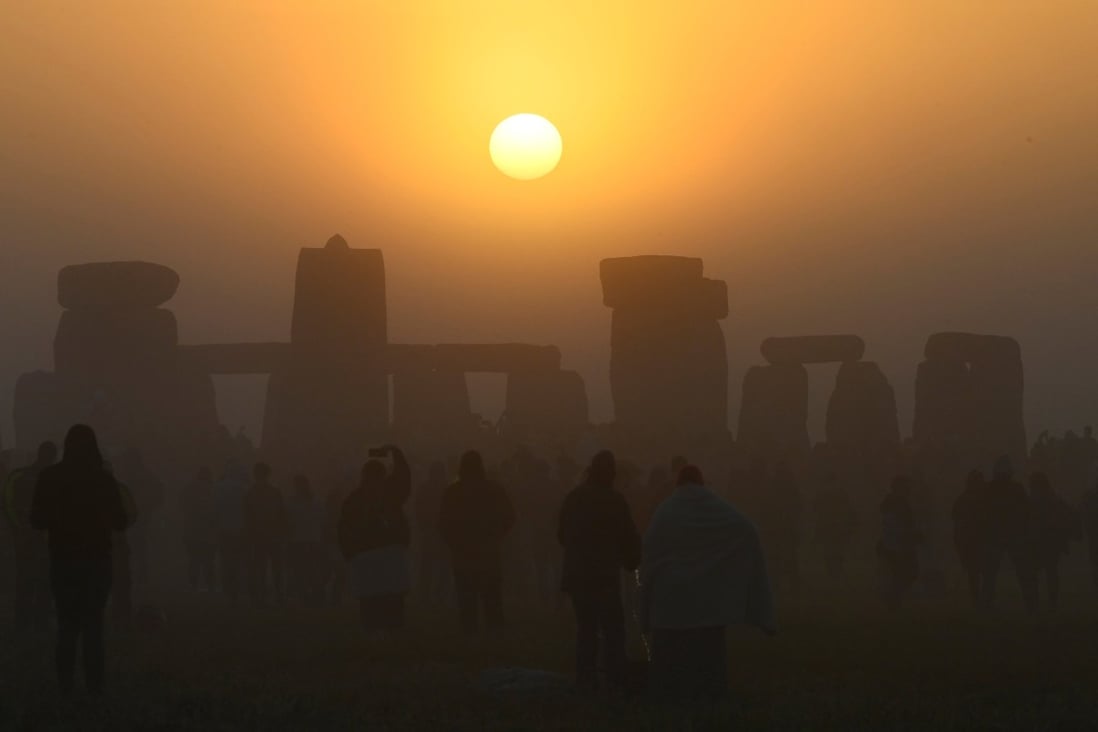 Revellers gather at Stonehenge to celebrate the summer solstice on Tuesday. Photo: Reuters