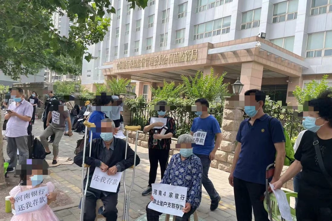 Account holders whose deposits were frozen in a banking scandal protest in Zhengzhou, Henan province in central China. Photo: Weibo