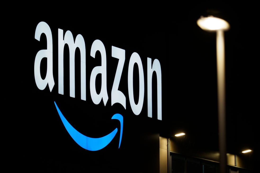 The Amazon logo is seen on the facade of a sorting centre. Photo: dpa