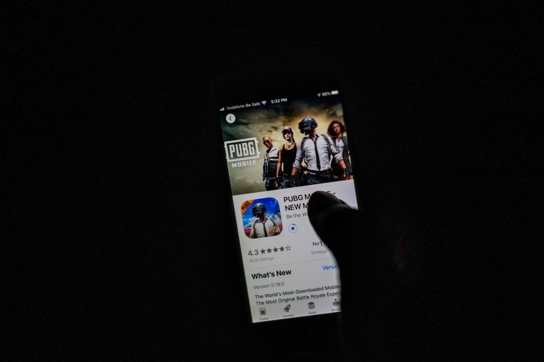 A man looks at the page of Apple’s App Store for PUBG Mobile, which is owned by Chinese internet giant Tencent, on September 2, 2020. Chinese video game companies saw a decline in revenue in May, both at home and abroad. Photo: AFP