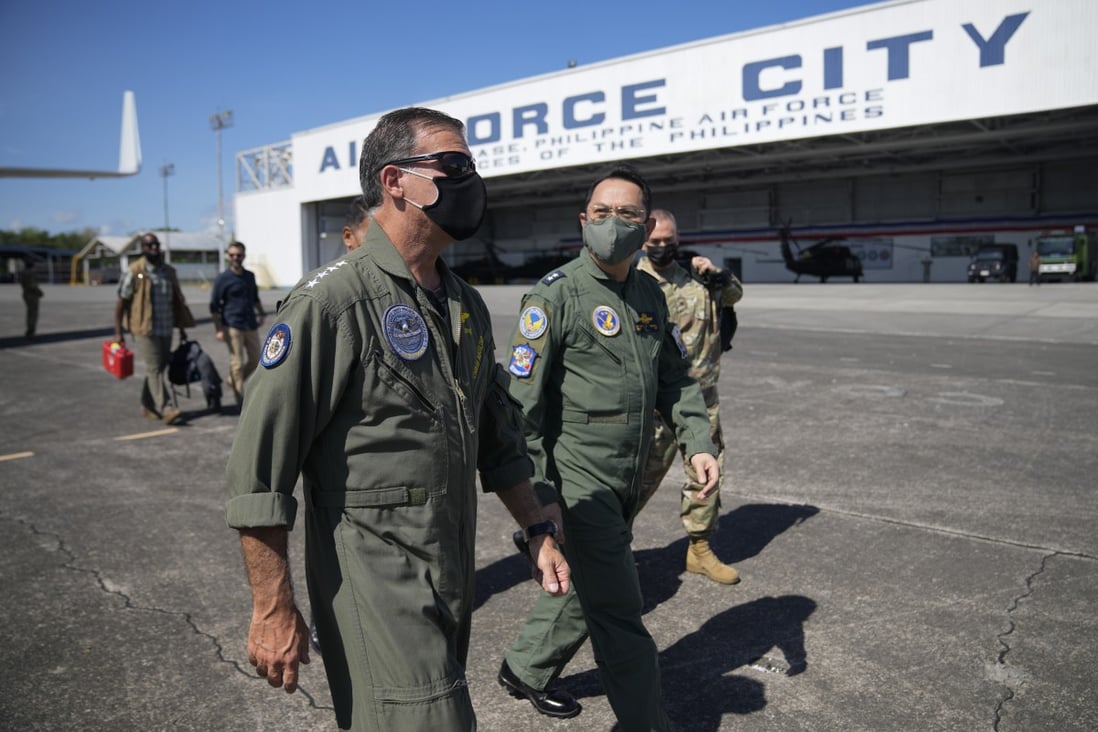 US Indo-Pacific Commander John C Aquilino, left, arriving at Clark Air Base in the Philippines in March. Photo: AP