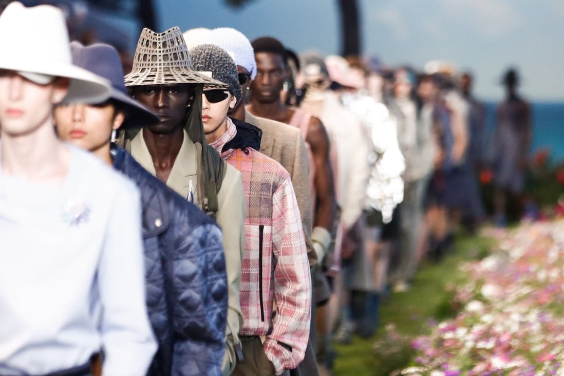 Models present creations from the spring/summer 2023 men’s collection by designer Kim Jones for Dior Homme during Paris Fashion Week, in Paris, France, on June 24. Photo: EPA-EFE