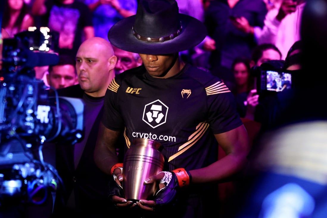 Israel Adesanya heads to the Octagon for his middleweight title bout against Jared Cannonier at UFC 276. Photo: AFP