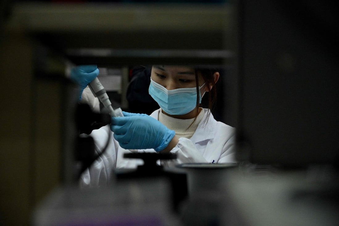 A laboratory technician works at a Tsinghua University lab in Beijing. Brii, Tsinghua University and the Third People’s Hospital of Shenzhen have co-developed a monoclonal neutralising antibody therapy. Photo: AFP