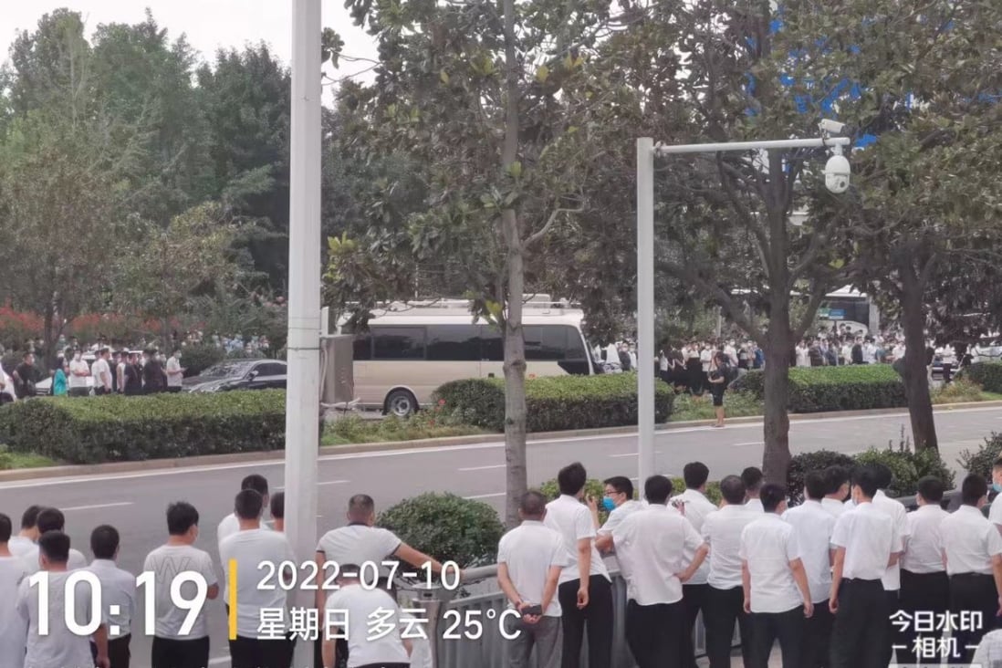 Groups of men in white appeared on the scene soon after the protests started. Photo: Handout