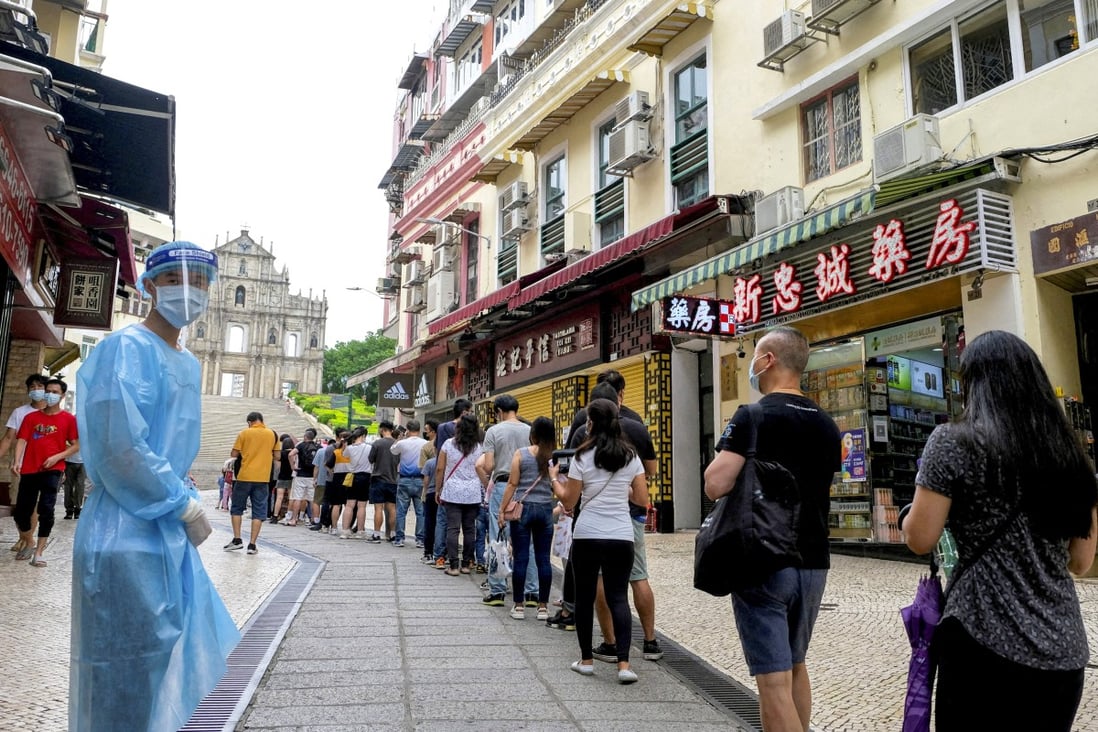 People queue for Covid-19 testing in Macau in this photo from June 2022. Photo: Reuters
