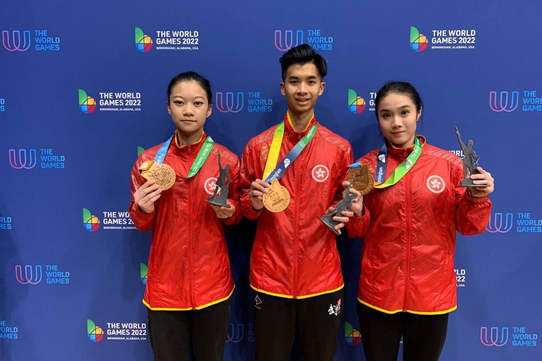 Wushu athletes Michelle Yung (right), Yeung Chung-hei and Lee Wing-yung (left) with their bronze medals. Photo: Hong Kong Wushu Union