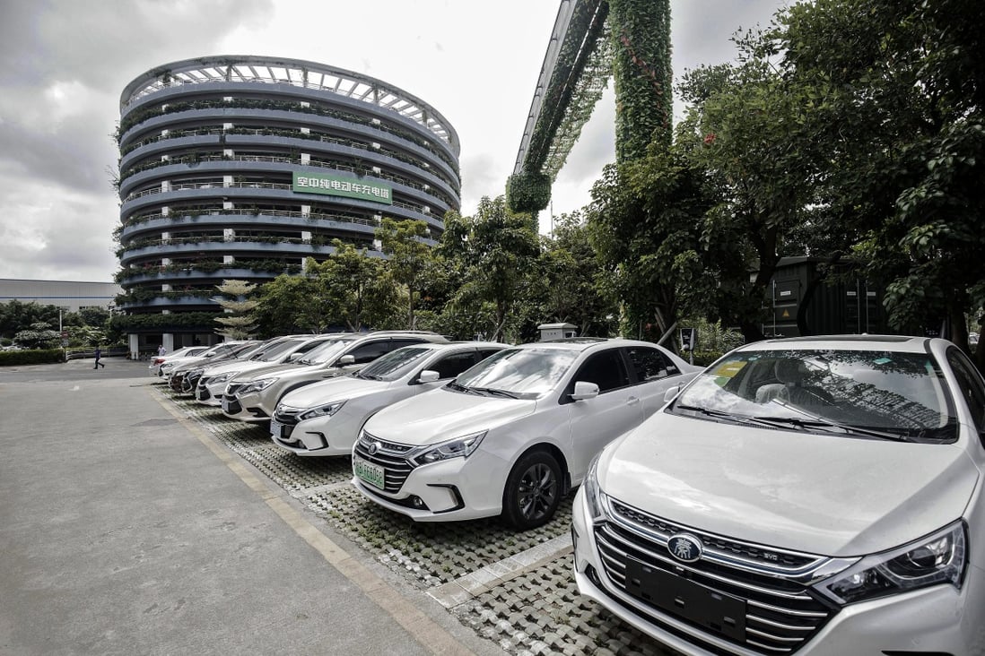 A fleet of BYD-made vehicles seen in front of a parking tower at the company’s headquarters in Shenzhen. Photo: Bloomberg