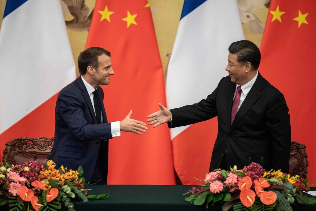 French President Emmanuel Macron (left) shakes hands with Chinese President Xi Jinping following a ceremony in Beijing in 2019. China’s zero-Covid policy has prevented Western European leaders from visiting the country for nearly three years. Photo: AFP