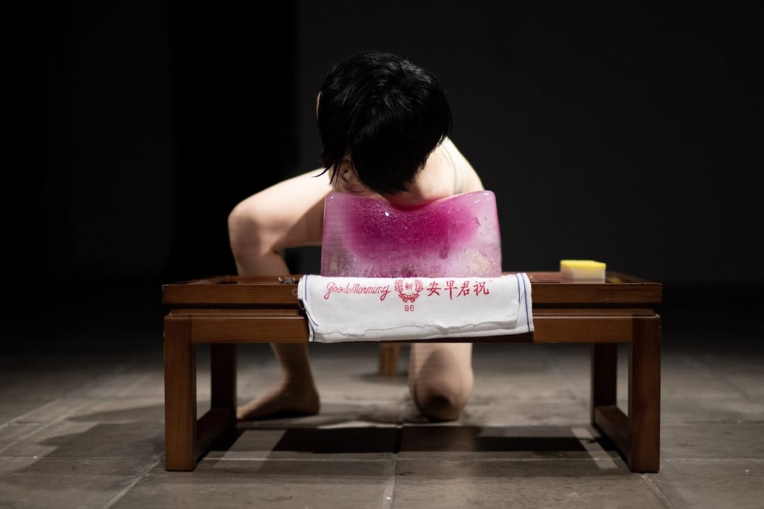 Artist Yeung Siu-fong performs “I’m Fine” (2021). Yeung is one of 18 artists participating in the Per.Platform performance art festival at the Eaton HK hotel from July 22 to 24. Photo: Gustav Lindgren