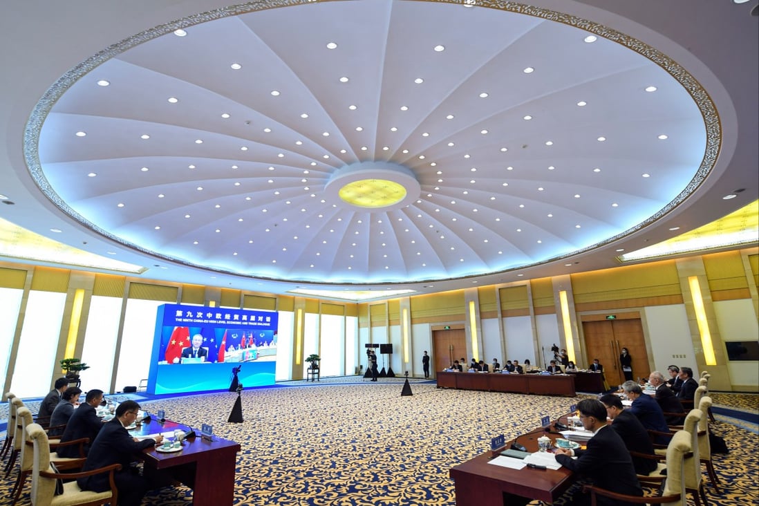 Chinese Vice-Premier Liu He and Valdis Dombrovskis, the European Union’s trade chief (on screen), co-chairing the 9th China-EU High-Level Economic and Trade Dialogue held via video link on Tuesday. Photo: Xinhua