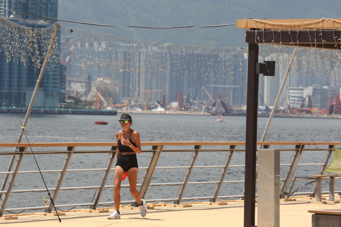 A runner braves the high temperatures at East Coast Park Precinct. Photo: Yik Yeung-man