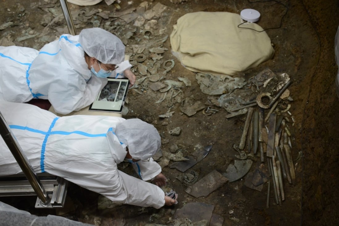 Archaeologists work at a sacrificial pit at the Sanxingdui ruins in southwestern China. Photo: Handout
