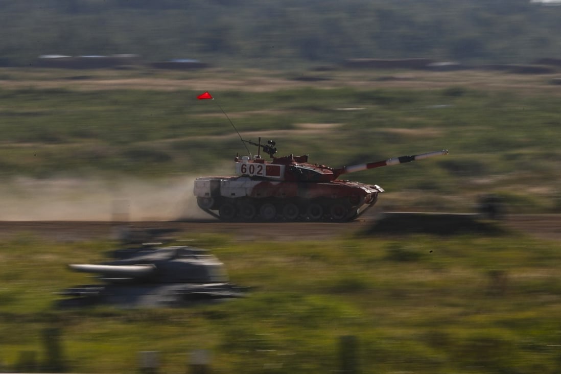 Chinese soldiers take part in the tank biathlon during the 2018 International Army Games in Alabino, Russia. Photo: EPA-EFE