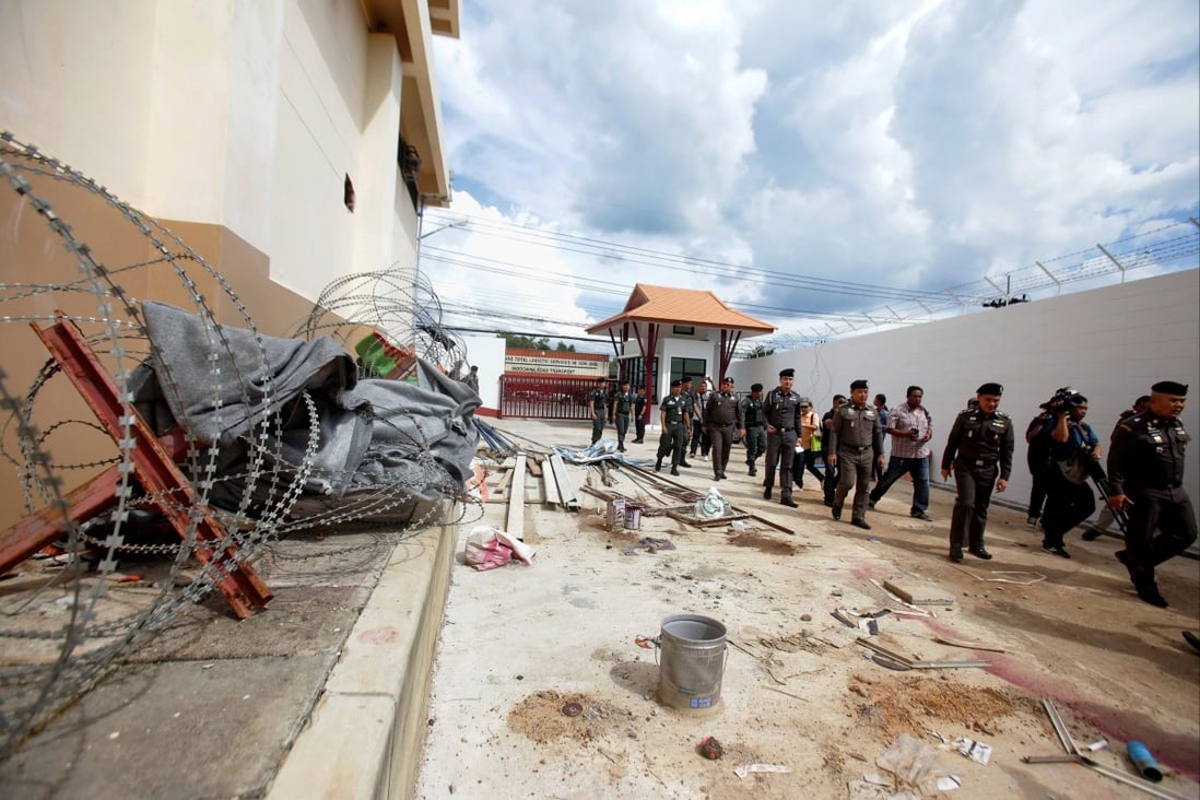 Police inspect the exterior of an immigration detention centre in Songkhla on November 21, 2017. File photo: AFP