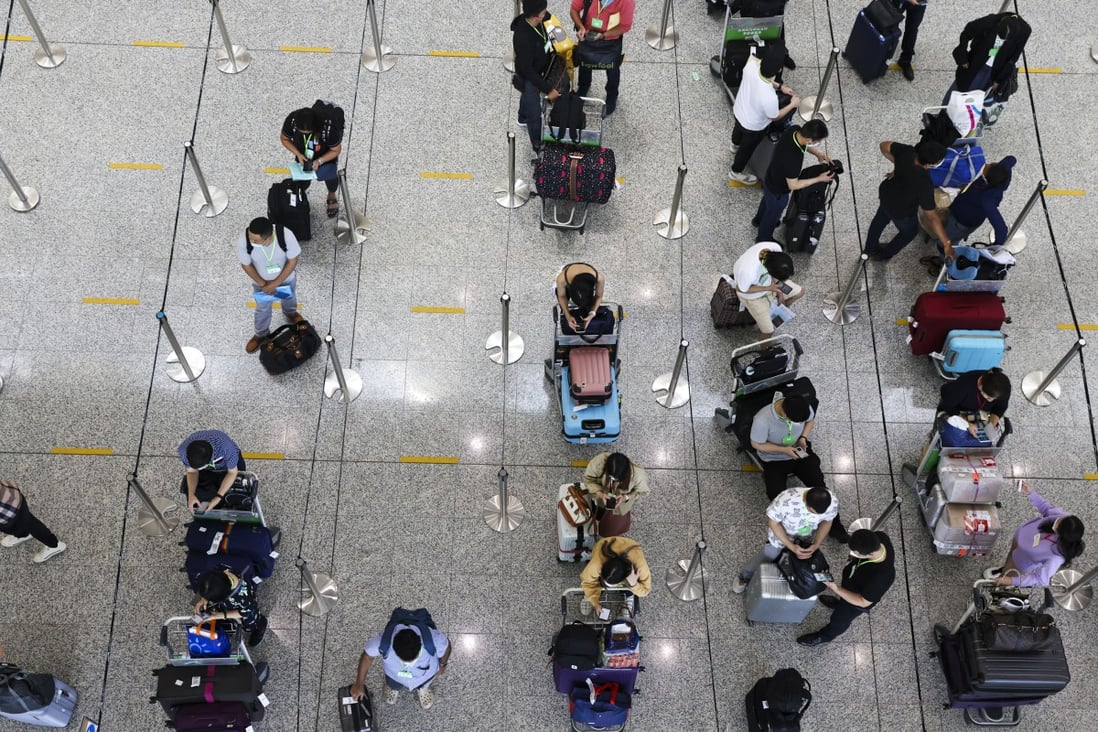Passengers arrive at Hong Kong International Airport on July 25. Photo: K. Y. Cheng