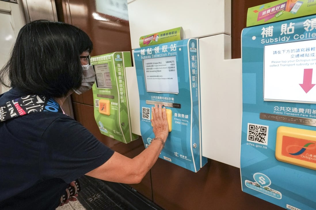 A Hong Kong resident adds consumption vouchers to her Octopus card in an earlier round of the economic stimulus scheme. Photo: Felix Wong.