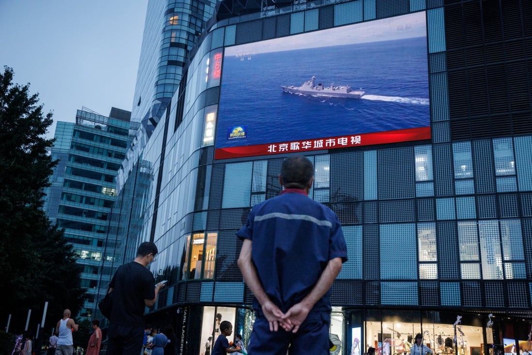 A man watches a CCTV news broadcast in Beijing about joint military operations near Taiwan by the People’s Liberation Army on Thursday. Photo: Reuters