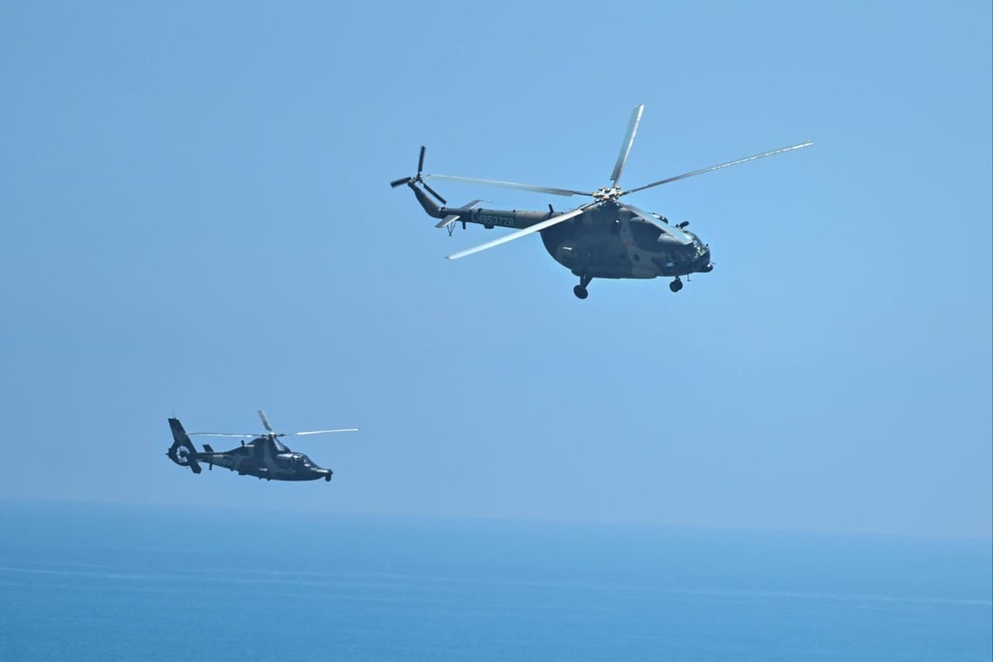 PLA military helicopters fly past Pingtan island in Fujian province - one of mainland China’s closest points to Taiwan - on Thursday. Photo: AFP