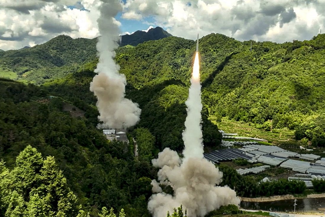 The Rocket Force of the PLA Eastern Theatre Command fires missiles into the waters off the eastern coast of Taiwan from an undisclosed location last week. Photo: Handout