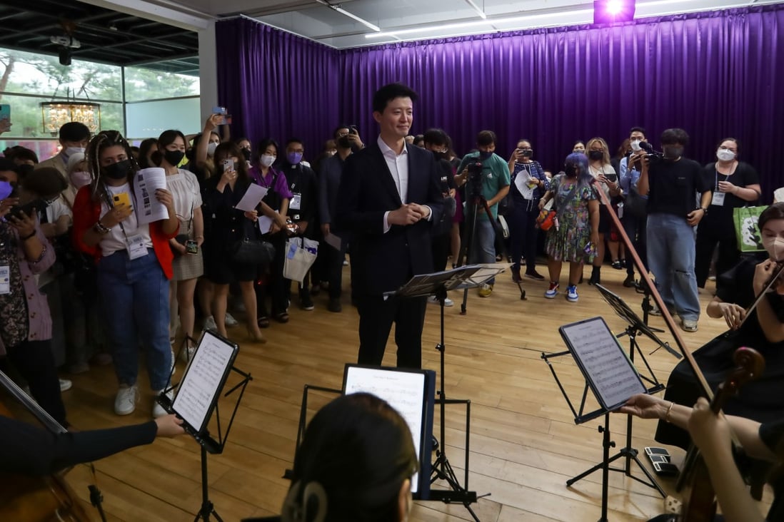 Composer Henry Cheng (centre) leads a performance of his “Suite to Army”, a 15-minute-long piece drawing on BTS hit songs and classical greats such as Bach and Wagner, at “BTS: The Third Global Interdisciplinary Conference in Seoul” in Seoul, South Korea. Photo: Courtesy of Henry Cheng
