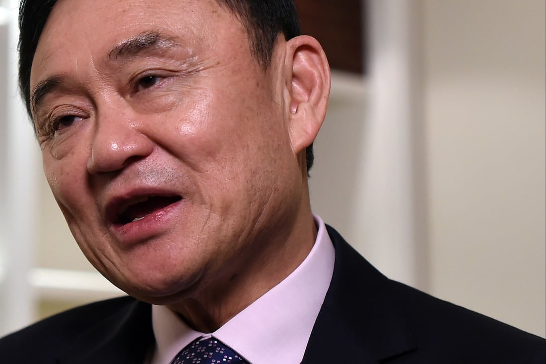 Currently in exile,  deposed former Thai Prime Minister Thaksin Shinawatra has called on supporters of the Pheu Thai party to vote strategically to end the reign of Prime Minister Prayuth Chan-ocha. Photo: AFP/File