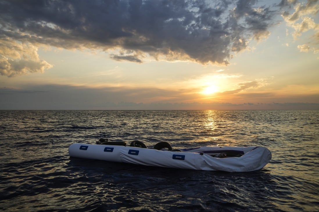An damaged rubber dinghy after migrants were rescued from it. Photo: AP 