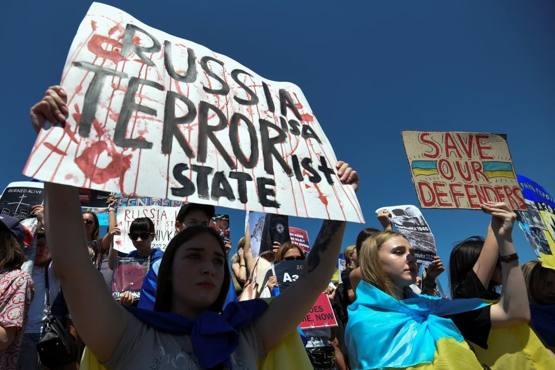 Ukrainians demand Russia is recognised as a state sponsor of terrorism after killing Ukrainian prisoners of war. Photo: Reuters