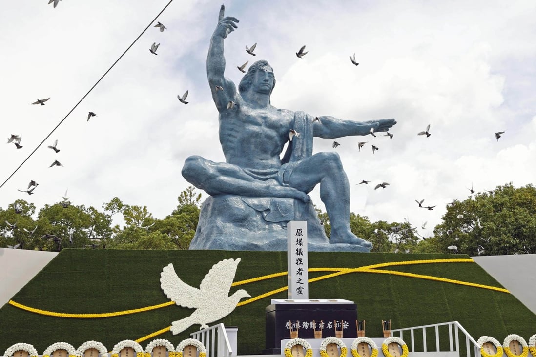 Doves are released at the Peace Park in Nagasaki on Tuesday during a ceremony marking the 77th anniversary of the atomic bombing of the city. Photo: Kyodo