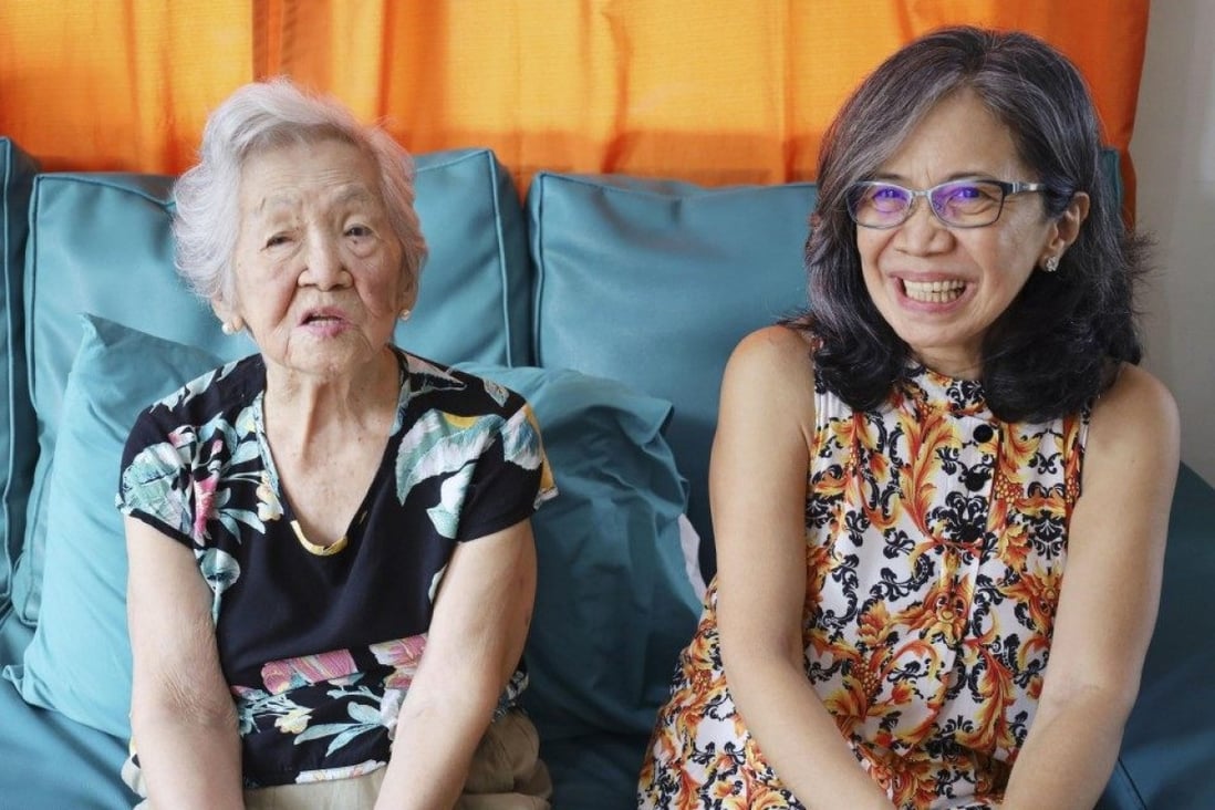 President of the new Palawan Nikkeijin chapter Margarette Lumauag, right, and her second-generation Nikkeijin mother Veronica Sabando are seen in their home in Puerto Princesa, a coastal city in the Philippines’ Palawan province, last month. Photo: Kyodo