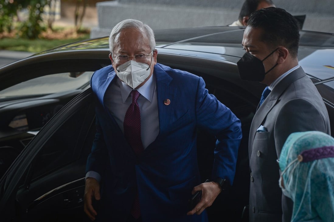 Former Malaysian Prime Minister Najib Razak (left) arrives at Kuala Lumpur High Court for the 1MDB trial. Photo: Bernama/dpa