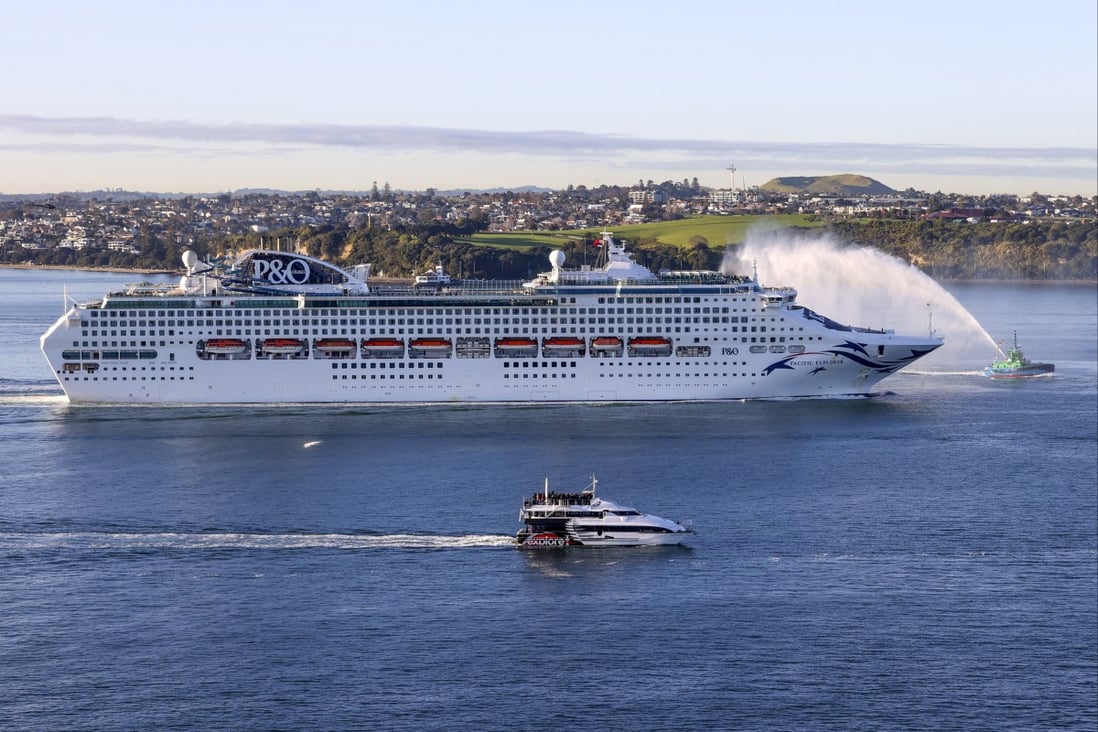 The Pacific Explorer cruise ship sails into the Waitemata Harbour in Auckland on Friday. Photo: New Zealand Herald/AP