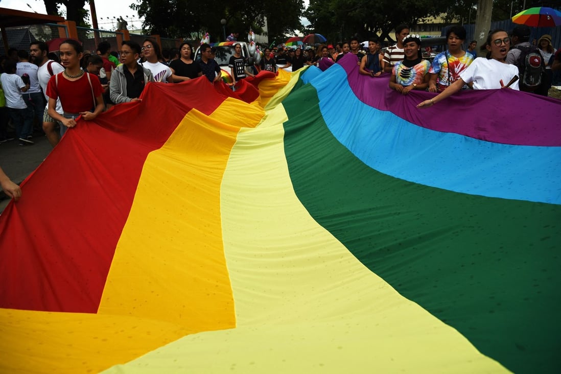 Members of the LGBTQ community at a pride march in Manila calling for the legalisation of same-sex marriage. Photo: AFP