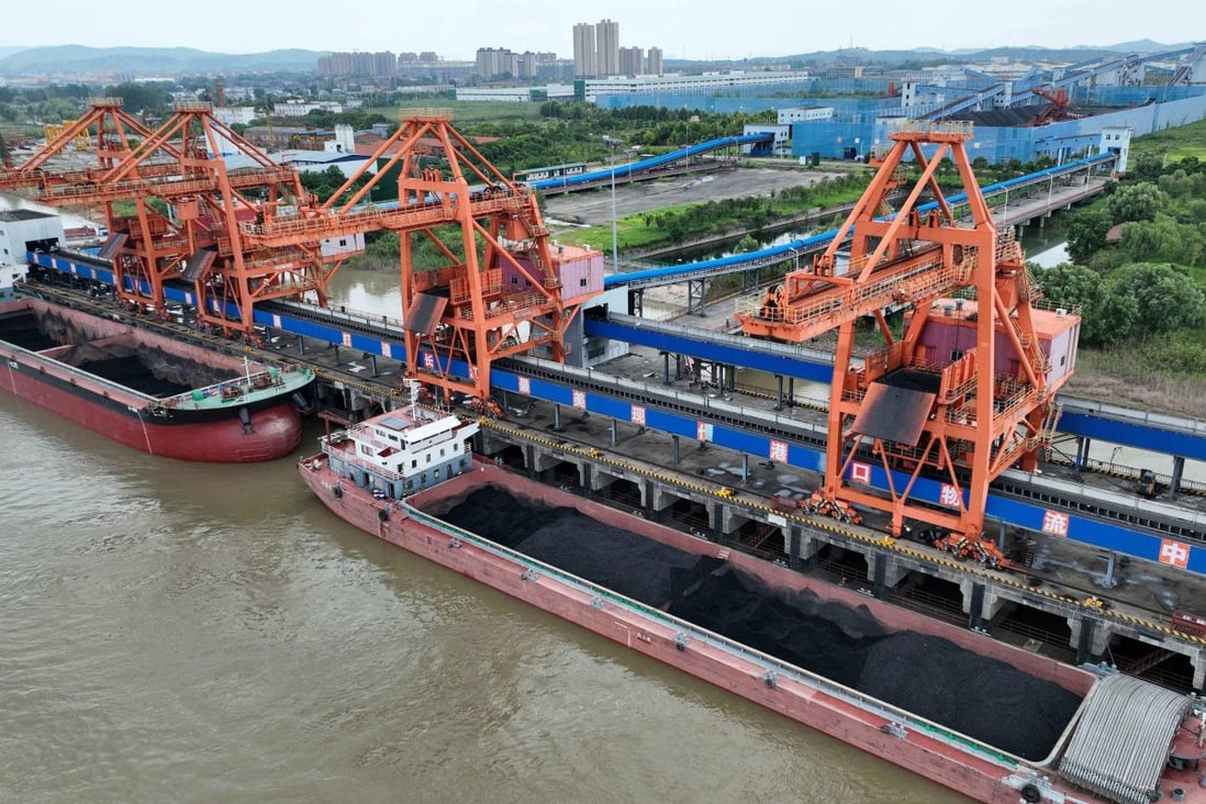 Coal-laden ships berthed at a port in Jiujiang, in China’s central Jiangxi province, on July 21, 2022. Photo: AFP