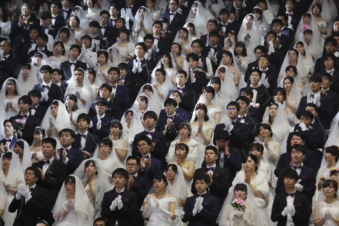 Couples exchanged or reaffirmed marriage vows in the Unification Church’s mass wedding in 2020. Photo: AP