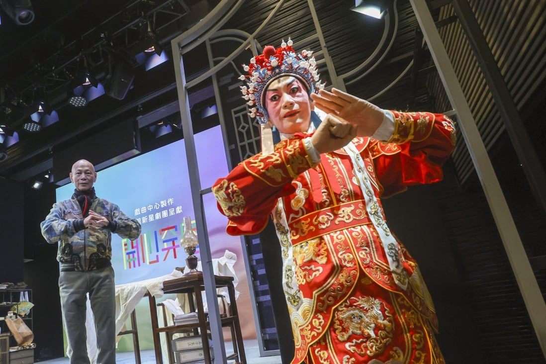 Cantonese opera singer and actor Law Kar-ying with an AI robot of himself at a dress rehearsal for Magic Tea House, a new show at the Xiqu Centre in West Kowloon, Hong Kong. Photo: Jonathan Wong