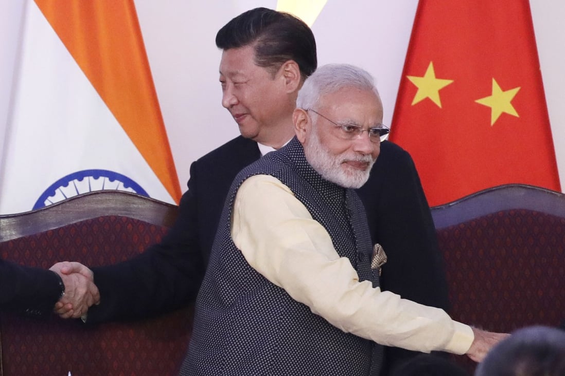 Indian Prime Minister Narendra Modi (front) and Chinese President Xi Jinping. In 2021, China was India’s single largest trading partner, and trade set new records. Photo: AP