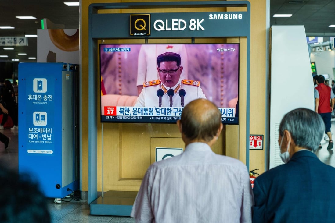 People viewing a news broadcast at a train station in Seoul, South Korea, as North Korean leader Kim Jong-un speaks after his country tested two cruise missiles on Wednesday. Photo: AFP