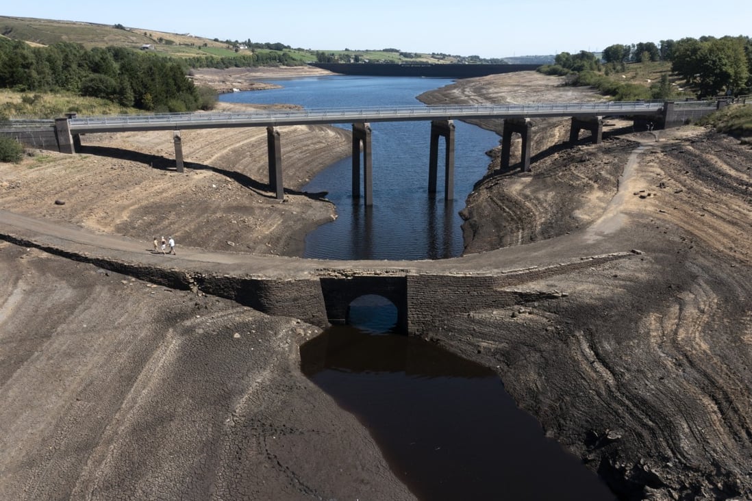 Low water levels at the Baitings Reservoir in Yorkshire, England, have revealed the remains of an ancient road. Photo: AP