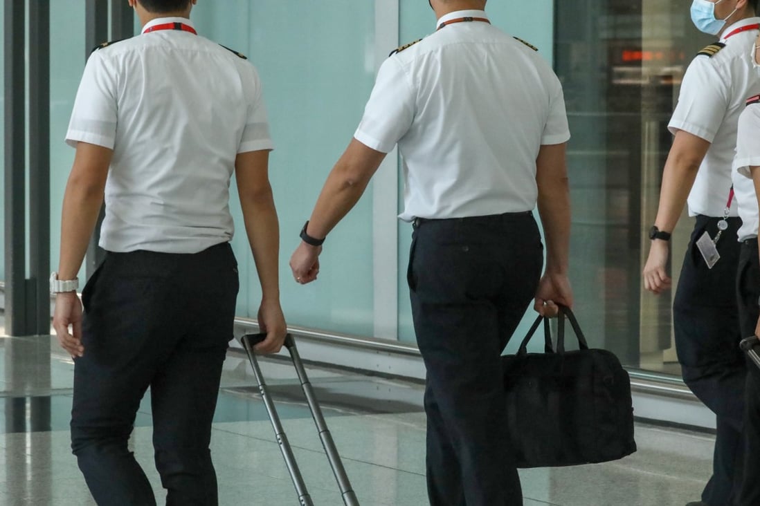Airline staff wheel luggage on route to a flight. Two pilots for Ethiopia Airlines have been suspended after reportedly falling asleep and missing their initial landing slot. File photo: SCMP