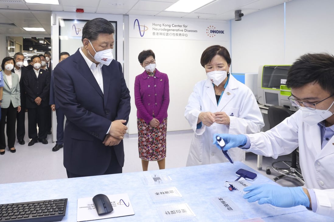 President Xi Jinping, accompanied by then chief executive Carrie Lam Cheng Yuet-ngor, visits the Hong Kong Center for Neurodegenerative Diseases, at the Science Park in Tai Po, on June 30. Photo: Xinhua
