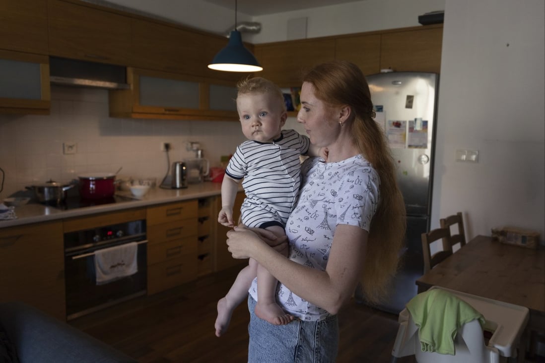 Taisiia Mokrozub, a Ukrainian refugee from Zaporizhzhia, with her son Hordii, in a flat in Pruszkow, Poland. Photo: AP 