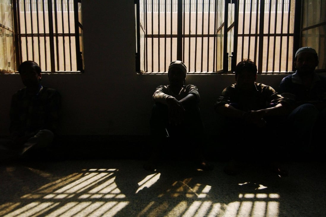 Indian inmates are seen sitting in their cell at the Tihar jail in New Delhi in 2005. The activist Jagtar Singh Johal has been held in the prison for more than four years. Photo: AFP